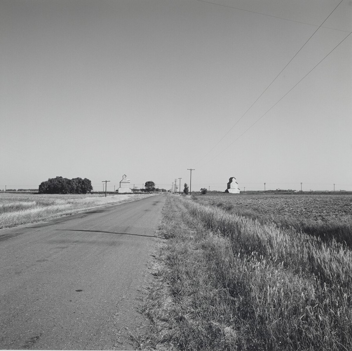 Landscape-Road and Two Grain Elevators-Near Kinsley, Kansas
