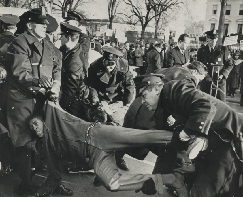 Title from caption on object: “Washington Police Carried Demonstrator out of the Way”