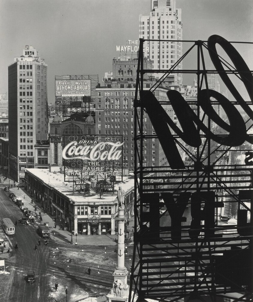 Columbus Circle: Broadway, Central Park West, and West 59th Street, taken from the 9th floor of the General Motors Building. The Coca-Cola signs tops the American Circle Building.