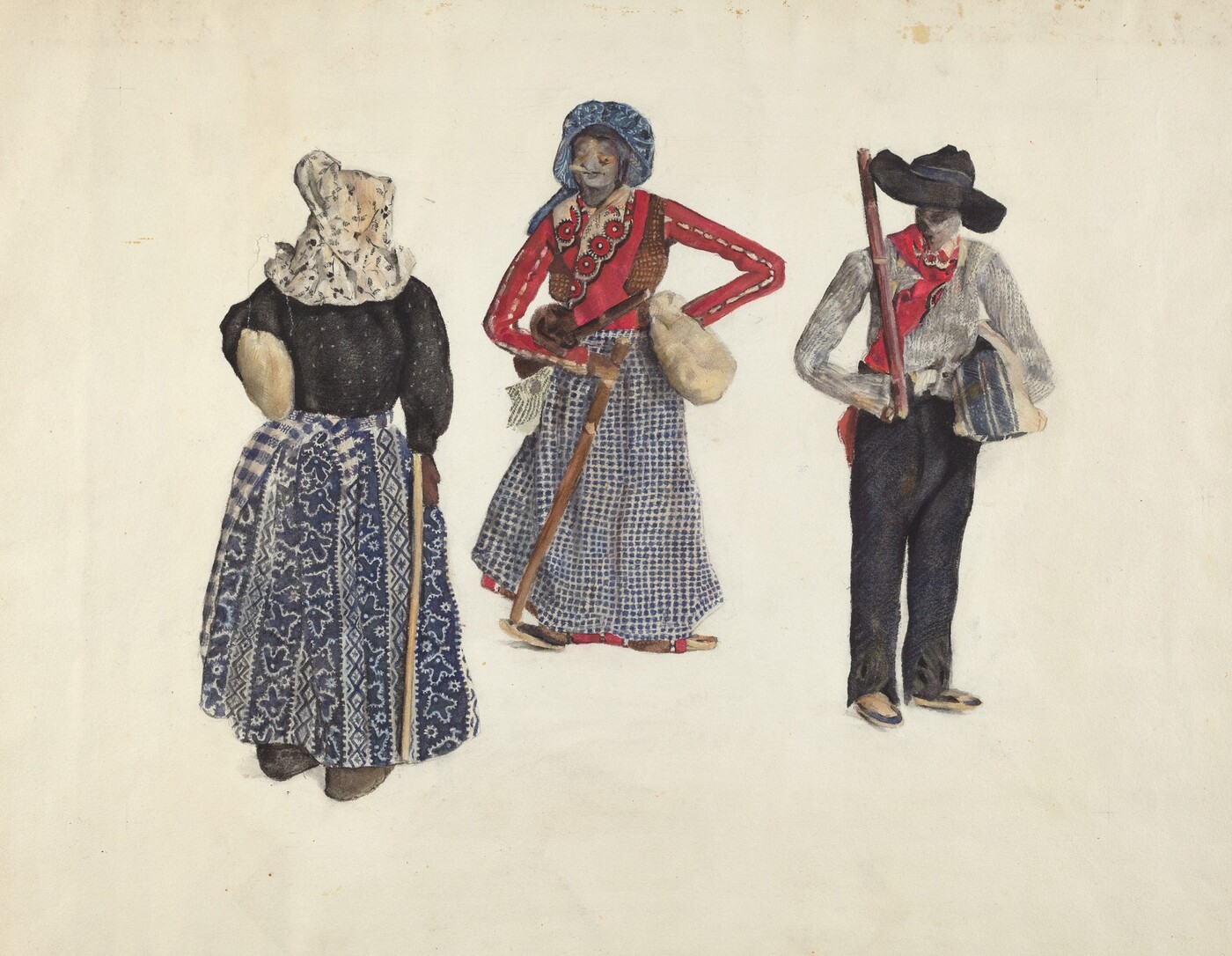 The image depicts three individuals dressed in traditional attire. On the left, a person stands with a hand on the hip, wearing a black top, long patterned skirt, and a white headscarf. In the center, another individual has a hand on their hip, wearing a red shirt, blue skirt, and a blue headscarf. They hold a staff and a bag. The third person on the right stands with a stick, wearing a gray shirt, black pants, a red vest, a black hat, and a decorative item at the neck. They carry a blue striped fabric. The background is plain.
