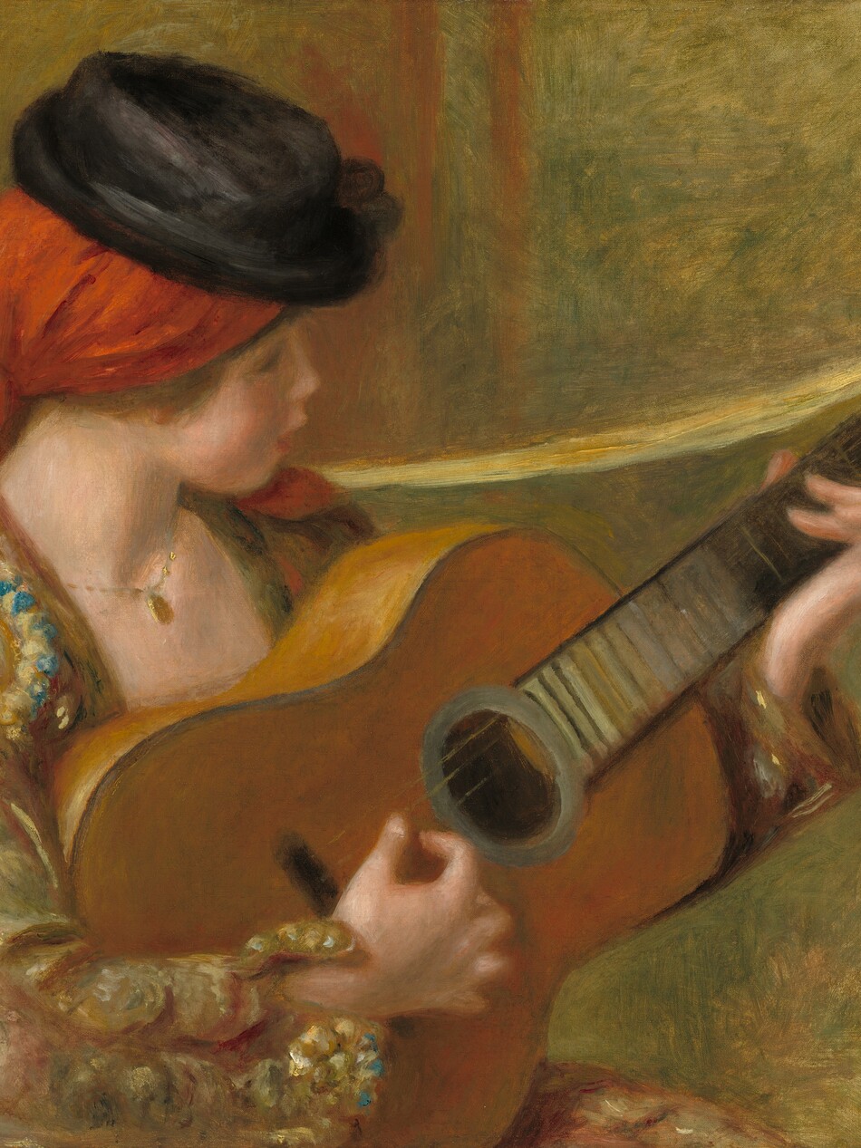 A young woman with pale, peachy skin and flushed cheeks sits facing our right in profile as she plays a guitar in this horizontal painting. The scene is painted with blended strokes, giving it a soft look and making some of the details indistinct. At the center of the composition, the guitar rests against the woman’s shoulder so it almost spans the width of the painting. The instrument has a caramel-brown body, and the dark brown neck lightens to slate gray by the sound hole. The woman’s eyes are lowered as she looks toward her left hand, her long fingers pinning the strings along the fretboard. She plucks the strings with her other hand.  Her hair is covered in a red headscarf tied at the nape of her neck. One end rests on her left shoulder, farther from us, and the other hangs down her back. A low, flat-topped, black, brimmed hat sits atop the scarf. The woman’s features are delicate, and her pink lips are parted. She wears a gold chain with an oval pendant around her neck. Her jacket is gold with a pattern loosely painted with dabs of lapis blue, butter yellow, and rose pink. A yellow ribbon or band is tied to the neck of the guitar and slung over her shoulder. The indistinct space behind her is painted with strokes of moss green, goldenrod yellow, and a few swipes of marigold orange near her face. The artist signed and dated the painting in brown in the lower right corner: “Renoir.98.”