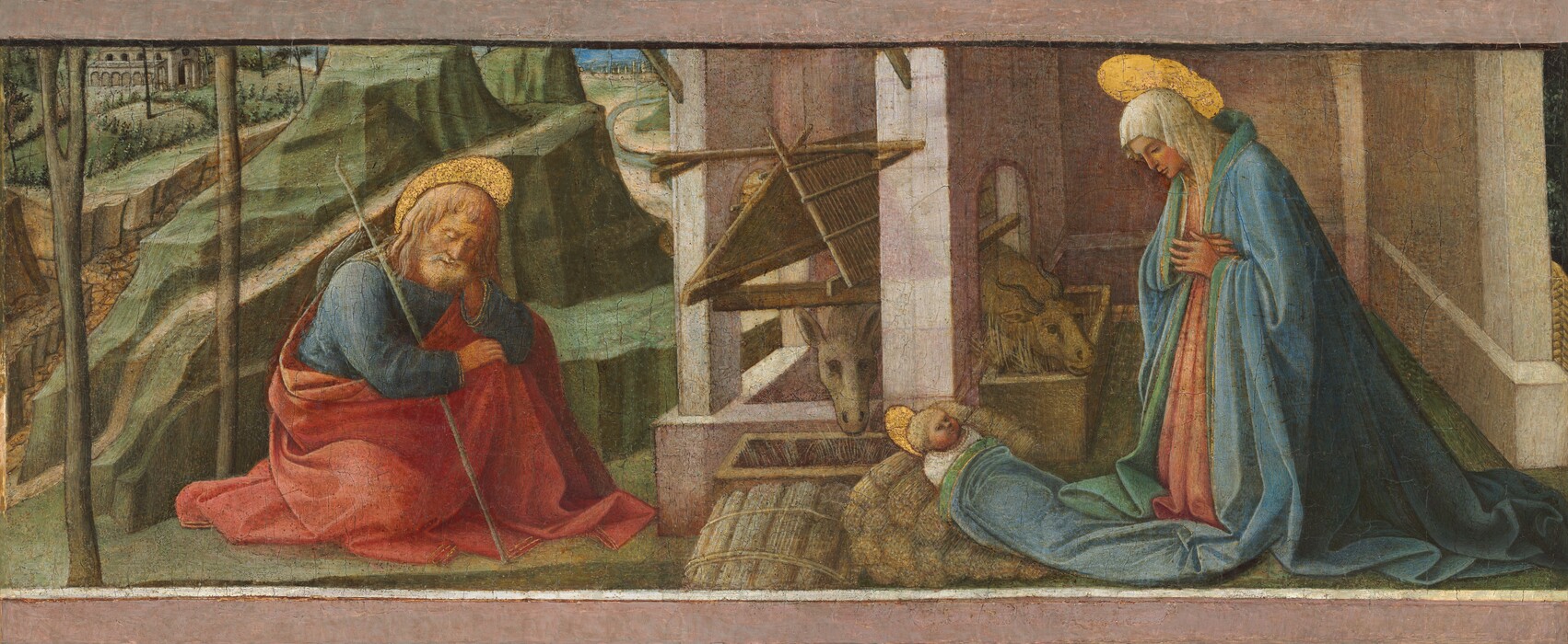A woman kneels in front of a baby under a stone structure to the right as a man sits and dozes in front of a landscape to the left in this wide, horizontal painting. All three people have pale, peachy skin with rosy cheeks and gold, flat, disk-like halos. To our right, the woman’s head and shoulders are covered with a white cloth as she crosses her hands across her chest. She wears a rose-pink dress under a voluminous, sky-blue robe lined with spruce green. The robe puddles on the floor behind her feet, and one section has been pulled forward to be used as a blanket for the baby. The child has blond hair and round cheeks, and is swaddled in white under the robe. He is propped up against stacked rolls of hay. A room-like space with pale pink stone walls stretches back beyond the woman. The wall to the left is pierced with an arched opening. A trough lines that wall on the woman’s side of the opening, and another is perpendicular to it, just beyond the baby. An ox pokes its head through the opening, and an ass looks across the second trough. To our left, the man sits with at least one knee pulled up. He has long blond hair, a white beard, and wears a sapphire-blue tunic and red robe. He leans one elbow on his bent knee and rests his head in that hand, his eyes closed. A staff with a sack tied to the end rests against his other shoulder. He sits on a flat, green area at the foot of sheer-cut, green, rocky hills. More hills, trees, and a path lead back into the distance to towns along the horizon. The upper and lower edges of the panel are painted with pale pink similar to the building, making it seem that we look through a partial frame at the scene.
