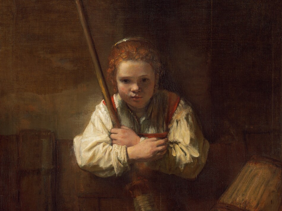 A pale-skinned young girl leaning over a low fence and holding a broom gazes in our direction in this vertical painting. Her red hair is pulled back from her round face, and she has large hazel eyes under thin brows, a petite nose, and her coral-red mouth is slightly open. She is shown from the chest up, behind a wooden partition that spans the width of the painting. She wears a loose, ivory-white shirt under a garment with pumpkin-orange straps on the shoulders and chest. She leans forward with her elbows hooked over the partition as she holds a long-handled broom to her chest. A wooden pail with a bronze handle is overturned to the right of the broom. A blocky brown object to our left is difficult to make out. A dark brown semicircular object close to us in the center of the composition resembles the mouth of a well. Soft light from the upper left illuminates the girl and the left side of the caramel-brown wall behind her and throws the right side into shadow. A signature near the lower left looks like it had been painted on the inner edge of the well. It reads, “Rembrandt f. 1651.”