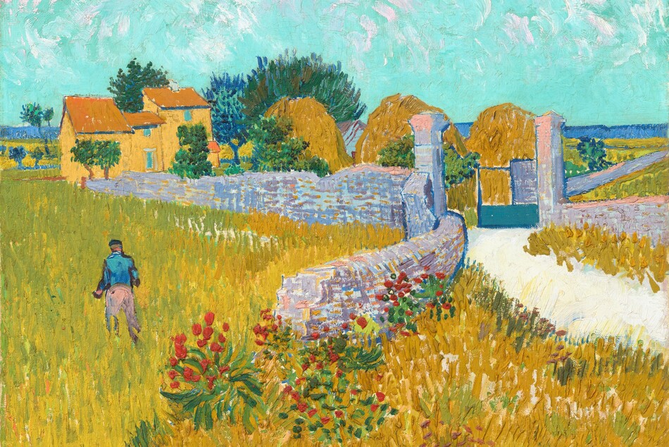 A white path and gray stone wall wind through ochre and harvest-yellow fields beneath a brilliant, turquoise sky in this stylized, horizontal landscape painting. The scene is created with long, visible brushstrokes of vivid color. Closest to us, the field is painted with vertical strokes of golden yellow and pea green. Touches of cardinal red and slashes of pine green create flowers around the end of the stone wall, which curves toward us from the background, at the center of this painting. The wall is painted with horizontal dashes of lilac and lavender purple, salmon pink, and periwinkle blue. A person wearing peach-colored trousers, a peacock-blue shirt, and a dark hat walks away from us, into the field, to our left of the wall. The white road enters the scene from the right, and meets the stone wall and a second wall on the far side of the road at a gate. Two columns rise from the walls to mark the spot of the gate, which opens into a property with three tall haystacks and a house. To our left, the house is painted with areas of warm yellow for the walls, honey brown for the roof, which is outlined in navy blue, and turquoise for the doors and windows. A few green trees, made of dots of bottle and forest green, are scattered near the house and haystacks. One sapphire-blue tree grows near the house. A band of azure blue along the horizon, which comes about two-thirds of the way up the painting, suggests a mountain range in the distance. Swirls of white suggest clouds in the turquoise sky. The paint is visibly textured throughout.