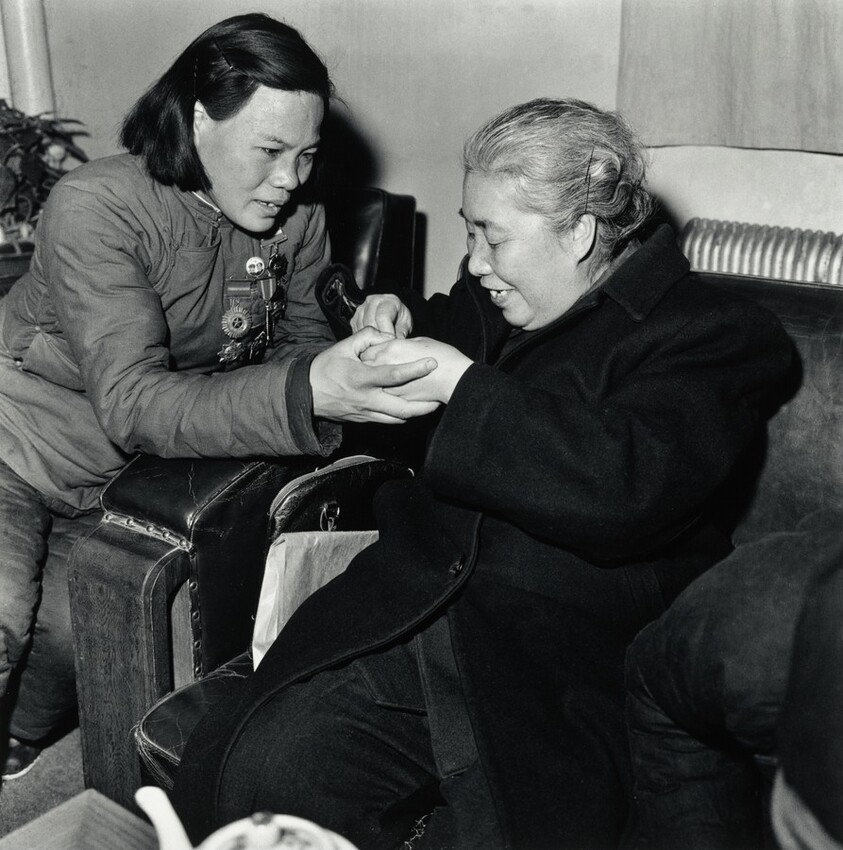 Xu Guangping and a Model Worker