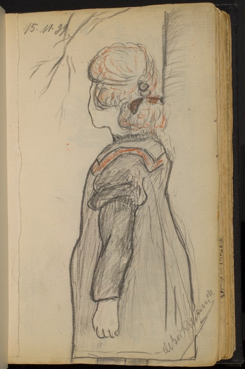 Young Girl Standing beside a Tree