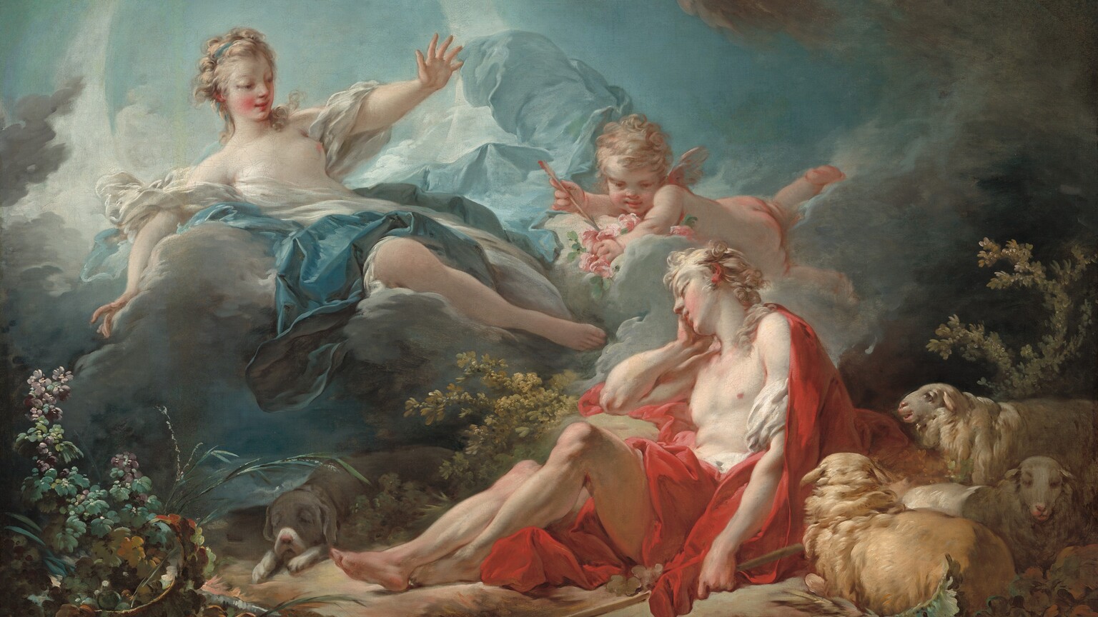 Close to us, a woman and a winged, child-like putto float on clouds above a clean-shaven young man in a forest setting in this horizontal painting. All three people have smooth, pale skin, rosy cheeks, and ash-blond hair. The man reclines with his torso propped so his feet extend along the rocky ground to our left. He rests his head in his right hand, farther from us, with that elbow resting on a rock. We look up onto the underside of his chin and delicate features. A scarlet-red robe falls from his shoulders and across his hips. One knee is propped up, and that foot is tucked behind his other ankle. His muscular torso, arms, and legs are bare. His left hand, closer to us, rests by his side and loosely holds a staff. Three tan-colored sheep with long faces lie or stand behind the man, in the lower right corner of the painting. A light gray hound dog with floppy ears sleeps with its drooping muzzle resting on its paws in the shadows at the man’s feet. The woman floats just above the man, reclining on a fog-gray cloud with her feet angled toward the man’s torso. Her curls are held back by a topaz-blue ribbon, and she looks down at the man, a faint smile on her lips. A loose white garment partially covered by a blue robe falls from her shoulders, leaving one breast and one leg bare. She reaches outward with her left hand, palm out, and the other hand rests down on the cloud alongside her. A sharply pointed, luminous crescent moon curves up to each side behind the cloud. The chubby, nude, baby-like putto nestles on his belly in a cloud between the man and woman. He has short, tousled hair, stubby wings, and his skin is flushed pink. An arrow held in one hand points toward the man, and the putto rests his other hand in a bunch of pink roses. Plants and flowers grow in patches on the ground around the man. The sky above is framed with steel-gray clouds against pale blue.