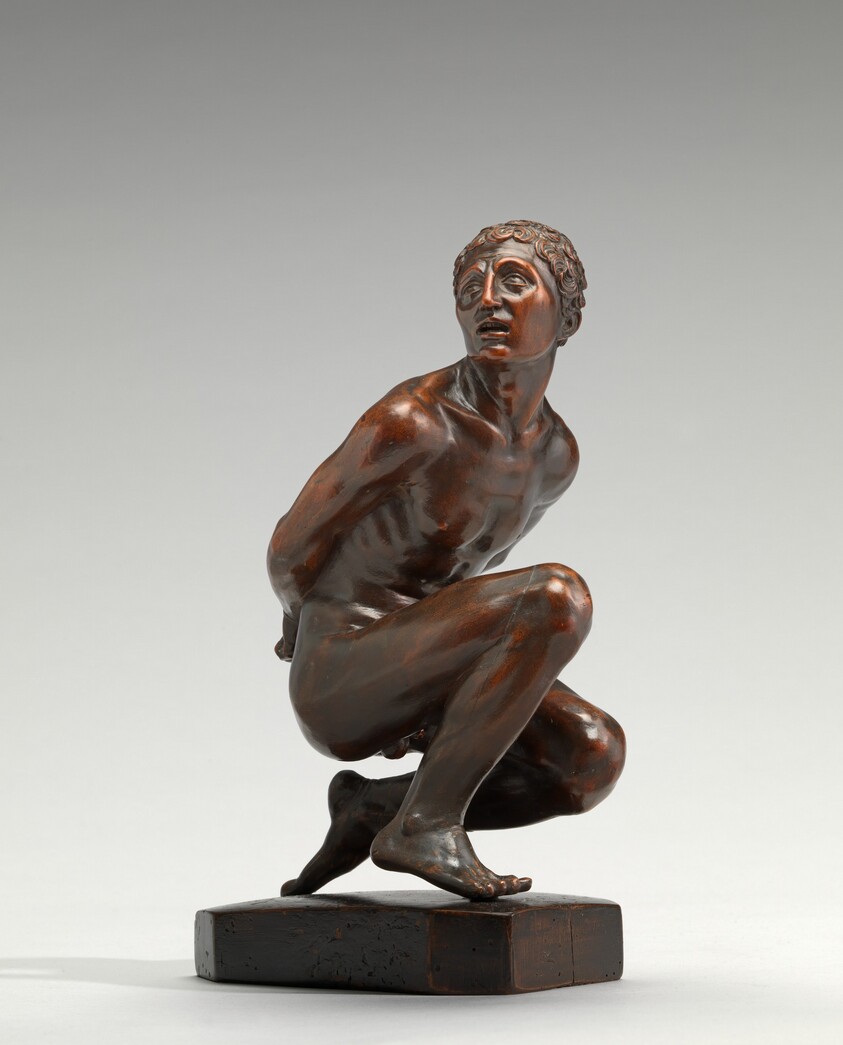 Kneeling Youth with Bound Hands