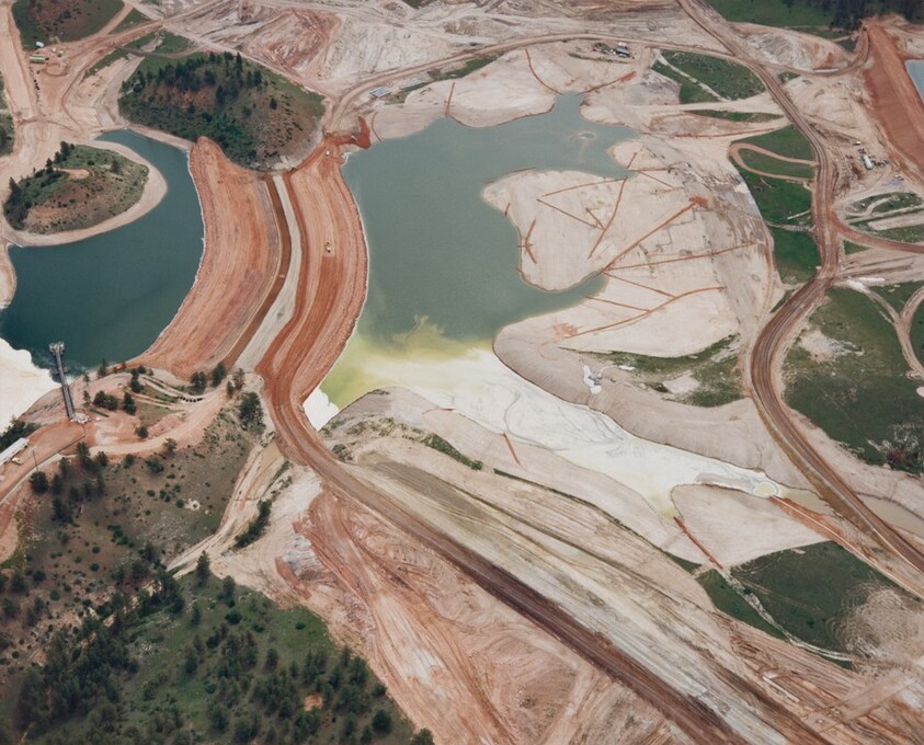 Excavation, deforestation, and waste ponds