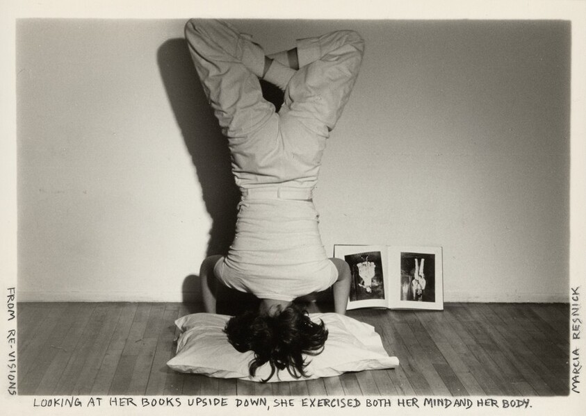 Looking at her books upside down, she exercised both her mind and her body.