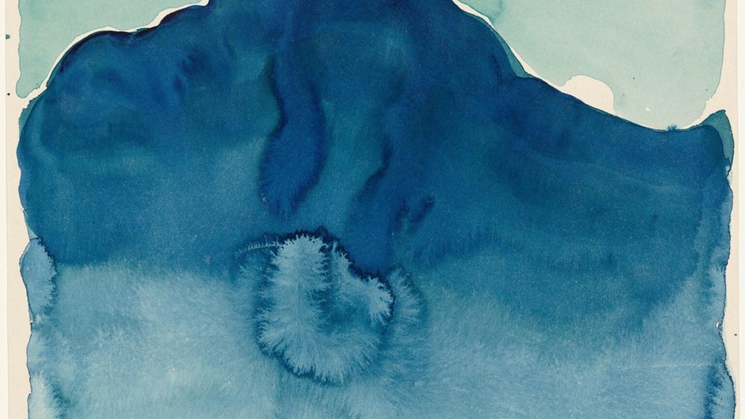 Pools of sapphire, aquamarine, and cobalt-blue watercolor puddle and bleed together in this abstract painting on paper. Most of the horizonal sheet is taken up with a dark blue form reminiscent of a hill. The upper corners of the sheet are painted powder blue, suggesting sky. The sheet is edged with the white of the paper, and the darker and lighter blue areas are also mostly separated by a thin white line.