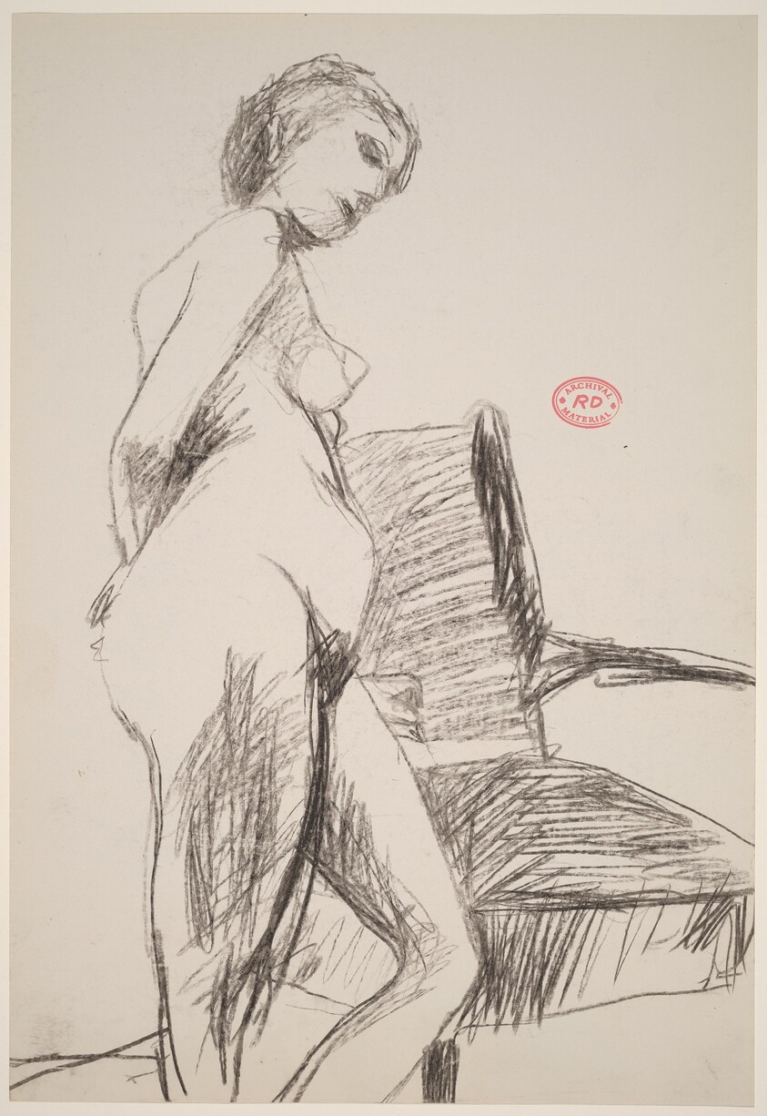 Untitled [side view of female nude leaning on an armchair]
