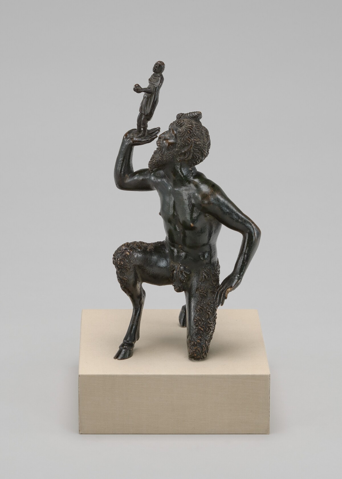 Kneeling Satyr Supporting the Figure of an Emperor
