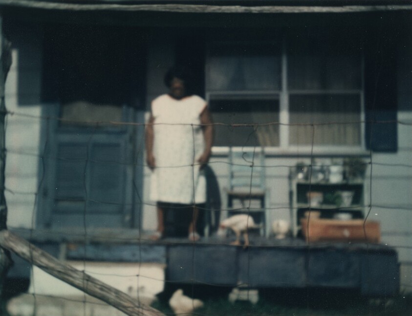 Untitled (Woman on porch)