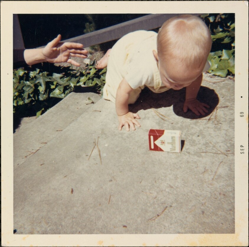 Untitled (Baby with cigarette box)
