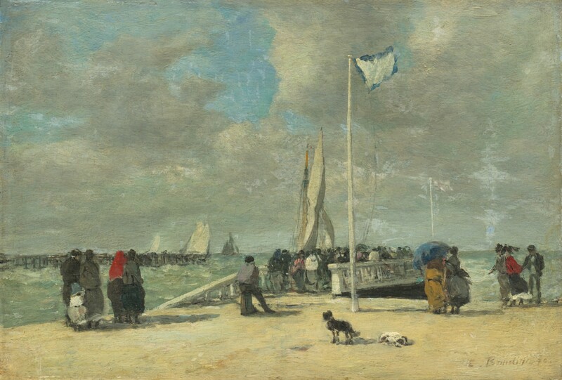 Eleven men, women, and children stand around a freestanding flagpole near a floating dock on a beach in this horizontal landscape painting. The scene is loosely painted, and dozens more people are gathered on the dock. The women wear dresses with long skirts in shades of charcoal gray, dark yellow, garnet red, and black, and one woman holds a muted blue parasol. The men wear suits in dark gray. A black dog stands and a white dog lies on the parchment-yellow beach near the flagpole, and the flag is white edged in blue. The dock angles away from us and to the right into the pale aquamarine-green water. Another dock in the distance lines the left third of the horizon, which comes about a third of the way up the composition. Puffy, smoky-tray clouds fill most of the blue sky above. The artist signed the lower right corner, “E. Boudin.”