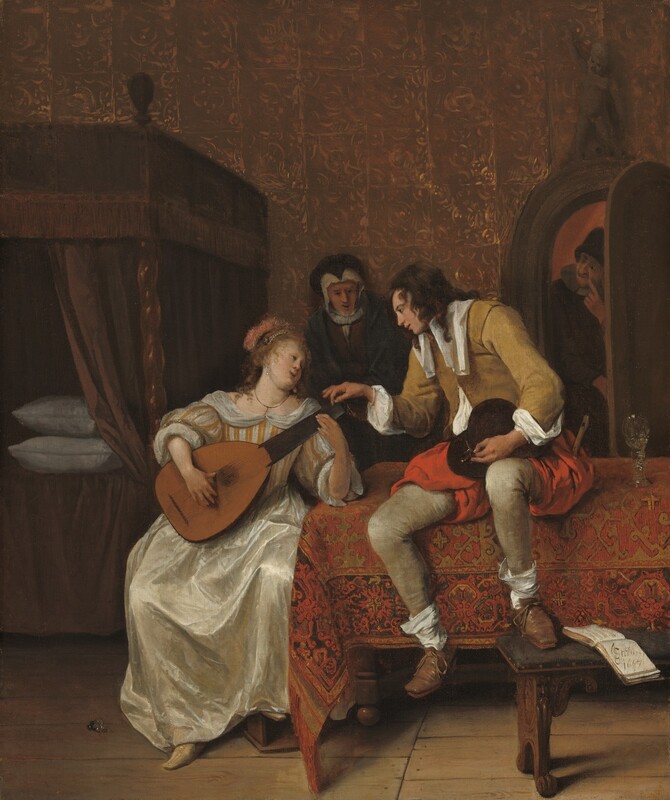 A woman playing a lute sits next to a table, on which a man perches and leans toward her in this vertical painting. Two people look on from the background. All the people have pale skin. The table is covered by cloth patterned in brick red, fawn brown, and black, and it extends off the right edge of the painting. The woman sits along the narrow end of the table to our left of center. Her body faces us as she holds the lute in her lap, one foot resting on a small wooden box. Her left elbow, to our right, is propped on the table to hold the neck of the lute. Her curly, blond hair is pulled back under a string of pearls and a fuzzy salmon-pink cap, or a feather, covers the back of her head. The bodice and puffy, elbow-length sleeves of her gown have cream-white and peach-colored stripes, and the ivory-white satin skirt falls to her feet. She wears a thin gold necklace and pearl earrings. With lips parted, she turns her face up to look at the cleanshaven man sitting on the table next to her. The man’s brown curls fall loosely over his shoulders. A long, wide white collar hangs down the front of his mustard-brown jacket. The voluminous white shirt he wears underneath shows where the jacket is unbuttoned near his waist and at his cuffs. He wears thigh-length, red pantaloons and close-fitting tan leggings. Baggy white socks hang around his ankles, and his brown shoes are tied with laces. A wooden flute sticks out of the pocket farther from the woman, and he holds a tall black hat in his lap, cradled in his left hand, to our right. With his other hand, he reaches to pluck a string near the peg board of the lute. One foot dangles off the edge of the table, and the other is propped on a bench, next to an open book. A glass with a tall stem and rounded bowl sits on the table next to him. Farther back in the shadows of the room, an older woman looks toward the couple, perhaps at the man’s hand on the lute, with her mouth slightly open. A white bonnet frames the woman’s face, and she wears a black hood and cloak over her dark dress. A bed under a box-like canopy sits along the back wall, and is cut off by the left edge of the painting. Dark curtains hanging from the canopy are pulled back to show two white pillows laid one atop the other. Also at the back of the room, to our right, a man peers in through a half-opened, arched door. He wears a conical, black, brimless hat and has a white collar over a dark coat. He looks toward the older woman with one index finger held to the corner of his grinning mouth. The wall is covered with gold-embossed, brown leather squares. The artist signed and dated the painting as if he had written in the open book on the bench: “J Steen 1667,” with the letters J and S entwined.
