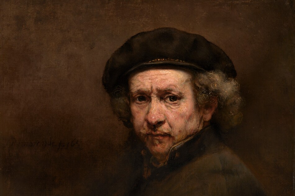 Shown from the waist up, an older man with pale, peachy skin looks out at us with deep-set, gray eyes under a furrowed brow, in front of a sable-brown background in this vertical portrait painting. His body is angled to our left, and his face turns to us. He has a faintly pink, bulbous nose, and his slightly sunken cheeks are shaded with gray. His peach-colored lips are framed with a wispy, gray mustache and goatee. Bronze-orange lines are incised within the battleship gray of his hair to create soft curls under his brown beret, which has gold trim around the base. The dark collar of his fawn-brown coat is turned up so his neck is covered. He is lit from the upper left, so his body and the right side of the painting are deeply shadowed. On our left, the canvas is painted with blended strokes of tawny and dark brown. His dark coat blends into the background, and his folded hands are in shadow in the lower left corner. The brushstrokes are visible in some areas, especially in the man’s face. The painting is signed and dated next to his shoulder, to our left, “Rembrandt f. 1659.”