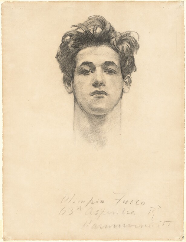 Drawn with tones of gray and black with charcoal on cream-white paper, a young man’s cleanshaven face floats near the top of the sheet. He faces and looks directly at us with his head tipped slightly back. His dark eyes are shaded under dark brows. His upper lip is full, and his mouth is closed in a set line. His thick, dark, slightly unruly hair sweeps back from his forehead, and he has a squared chin line. The lines indicating his neck fade where they would meet his shoulders. The work is inscribed with charcoal under the man’s head, near the bottom of the sheet: “Olimpio Fusco 63A Aspinlea Rd Hammersmith.”