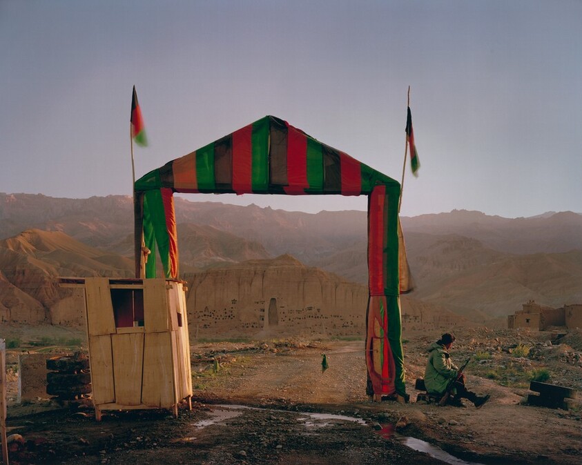Victory arch built by the Northern Alliance at the entrance to a local commander's HQ in Bamiyan. The empty niche housed the smaller of the two Buddhas, destroyed by the Taliban in 2001.