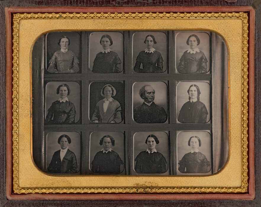 The image is a collage of twelve individual portrait photographs. The portraits show the upper body or head and shoulders of the subjects, positioned in three rows of four portraits each. The individuals are directly facing the camera and have neutral expressions. They wear formal clothing typical of a past era, with the men in suit jackets and white shirts, and the women in dresses with visible collars. The subjects have neatly styled hair, ranging from combed-back styles for the men to parted and tied-up hair for the women. There are no visible jewelry or objects among the subjects. The background of each portrait is a neutral, dark shade. The collage is presented within an ornate, gilt-edged frame.