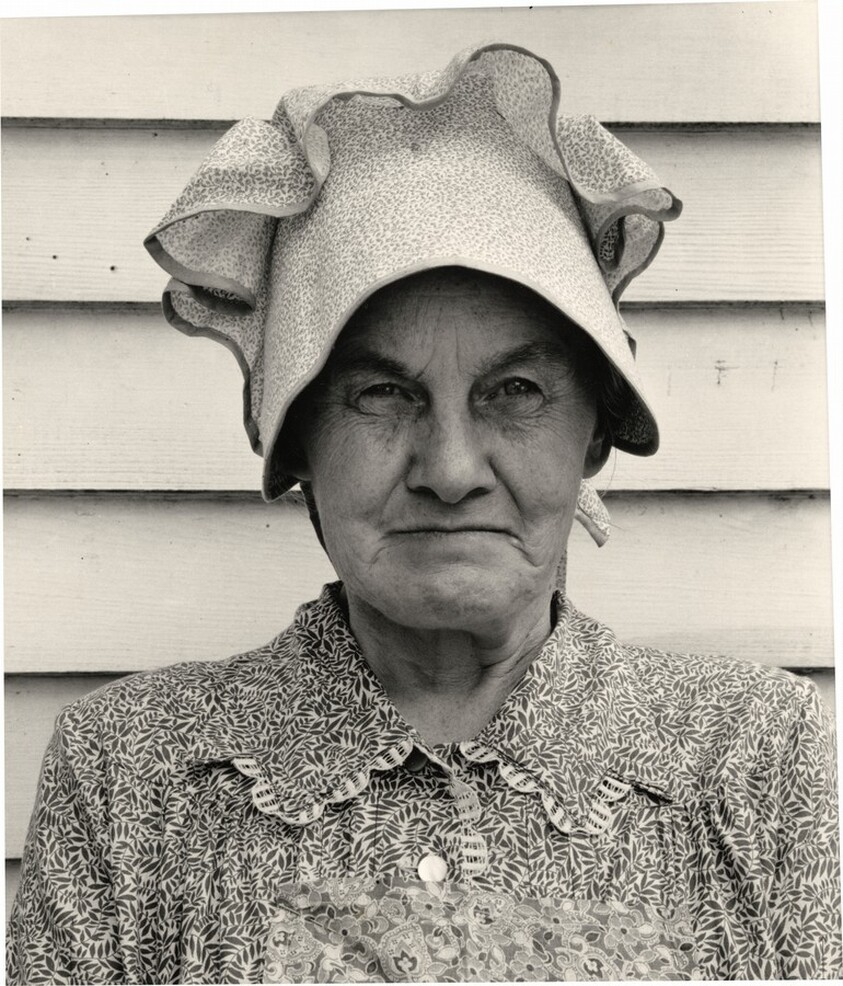 Member of the congregation of Wheeley's church who is called "Queen." She is wearing the old fashioned type of sunbonnet. Her dress and apron were made at home. Near Gordonton, North Carolina