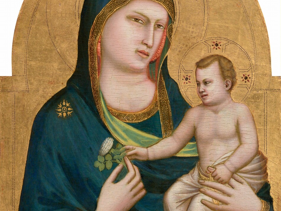 A woman with pale skin holds a baby in the crook of her left arm, on our right, against a gold background in this vertical, arched wooden panel. The woman is shown from the waist up with her body angled slightly to our right. She wears a dark blue mantle that drapes over her head and shoulders, and across her body. The garment has a gold border and celery-green lining where it turns over at her wrists and chest. There is a gold starburst-like symbol on her right shoulder, our left, and she holds a stylized rose with her right hand. The baby is nude except for a translucent white cloth, also edged with a gold border, wrapped around his waist and legs. His face and body look more like a small man than a baby, but there are baby-like rolls at his wrists. He has blond wavy hair. He grips the woman's forefinger on the hand that holds his body, and he reaches for the rose she holds with his other hand. The gold background is punched to create halos around their heads and decorative bands along the inner edge of the curving, arched top.