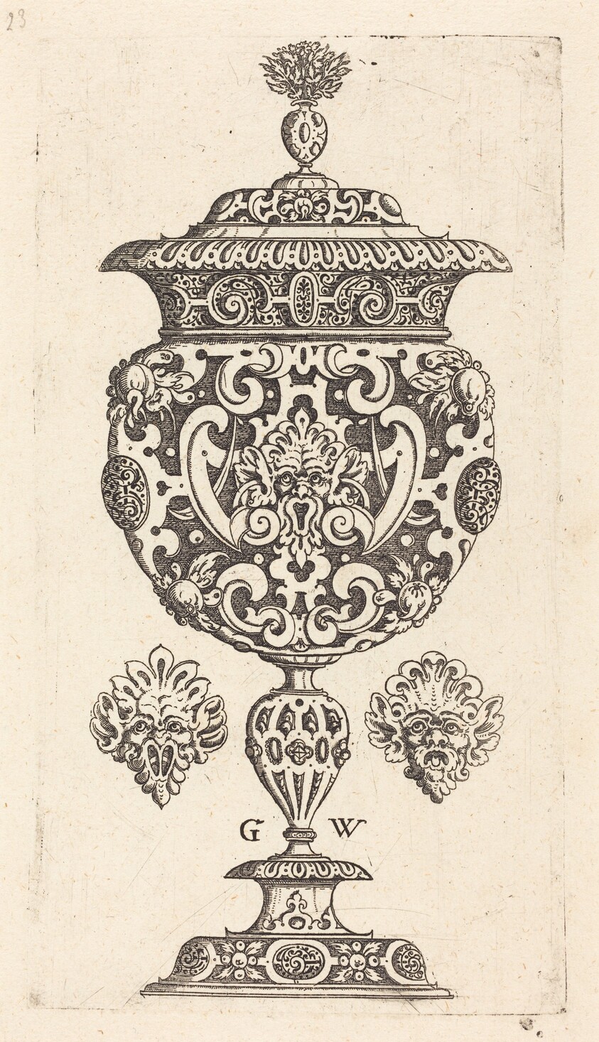 Goblet, rim decorated with masque with  gaping mouth