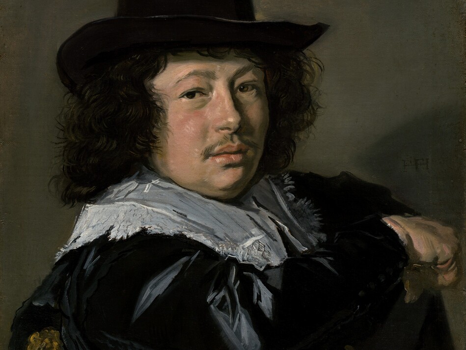 Shown from the chest up, a young man with a plump, pale-skinned face hooks one elbow over the back of a wooden chair and looks at us in this vertical portrait painting. The man’s body faces our right as he turns his head over his right shoulder, closer to us, to gaze out with brown eyes under lifted brows. His nose ends with a round bump, and his round cheeks are flushed. He has a wispy mustache over full pink lips, which are parted. He wears a tall-crowned, brimmed black hat over a cloud of wavy, shoulder-length black hair. A lace-edged white collar spreads over an ink-black, satin coat. His right elbow is planted across the back of the chair, which has carved finials to either side. That hand is closed in a fist, which may hold something. The man’s hat casts a shadow on the right side of the taupe-gray wall behind him, where the artist has signed the painting with two monograms of his initials, “HF.” The brushwork is loose throughout, especially so in the man’s clothing.