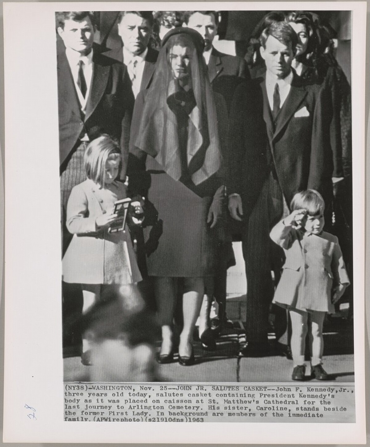 Title from caption on object: "John Jr. Salutes Casket"