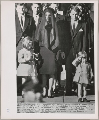 Title from caption on object: "John Jr. Salutes Casket"