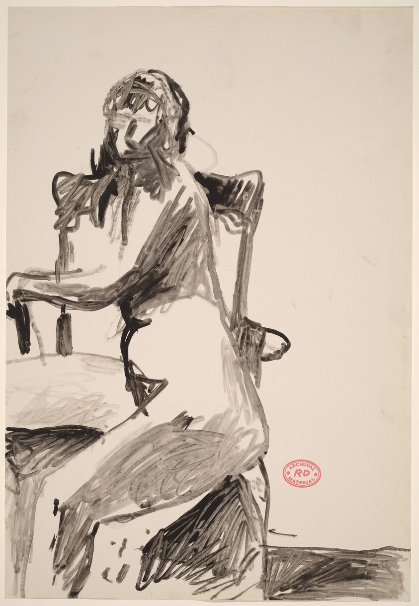 Untitled [seated female nude turned sideways in armchair]