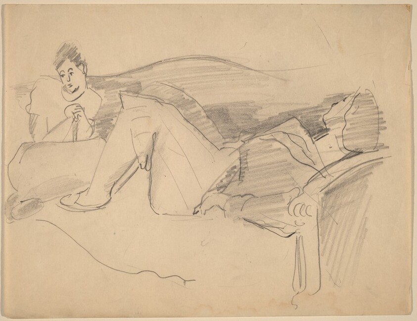 Two Women Lounging on Sofa