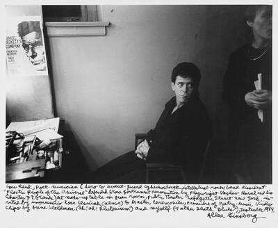 Lou Reed, poet-musician (hero to avant-guard Czechoslovak intellectual rock-band dissident "Plastic People of the Universe" defended from government persecution by playwright Vaclav Havel and his Charter 77 friends) at make-up table in green room, public Theater Lafayette Street New York, invited by impresario Rose Lesniak (above) to Master Ceremonies, Premiere of Poetry- Music Video Clips by Anne Waldman ("uh! oh! plutonium") and myself ("Father Death Blues"), September 1984., Allen Ginsberg, 1984, printed 1991