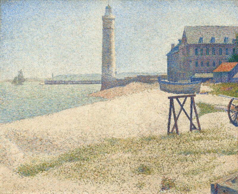 Painted entirely with small dots of pure color mostly in slate and azure blue, olive green, and cream white, this scene shows a sandy beach stretching to a lighthouse at the center and a four-story building to our right in this horizontal seascape. The tall, slender lighthouse standing on the water’s edge a short distance from us is painted with specks of azure and sky blue, ivory, and peach. In the distance to our left, a pier stretches into the sea along the horizon, which comes about two-thirds of the way up this composition. A sailboat floats just off the pier, near the left edge of the painting. To our right of the lighthouse and extending off the right edge of the canvas, the building has three levels of windows and a row of dormers along the tall, peaked roof. The building is painted with touches of dove gray, sapphire blue, and pale pink. In front of the building and to our right, a denim-blue shed has a tangerine-orange roof. A wooden rowboat outlined in cornflower blue with flecks of dandelion yellow rests on the sand next to the shed. In front of us, dots of moss green blend into the blond tones of the sand, creating an impression of grass on the beach. Sunlight shimmers on the sea to our left, which is painted with short dashes of mint and seafoam green, baby blue, cream, and shell pink, beneath a clear, ice-blue sky.