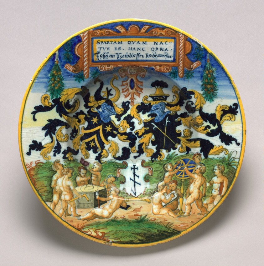 Plate with a heraldic design