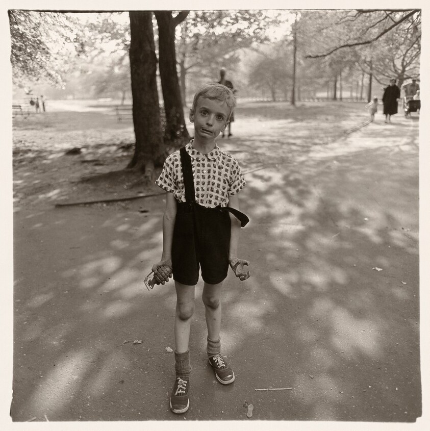 Child with toy hand grenade, N.Y.C. 1962