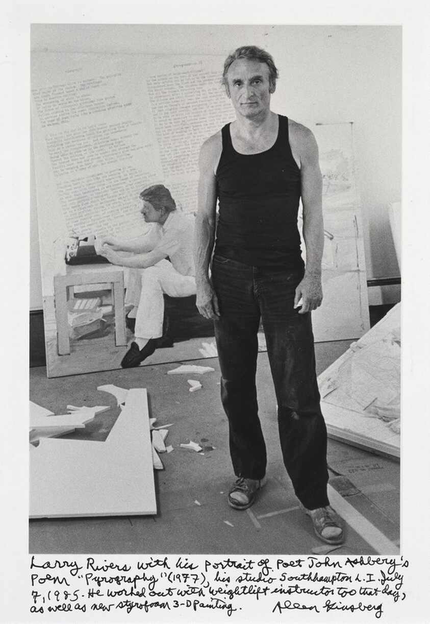 Larry Rivers with his portrait of poet John Ashbery’s poem “Pyrography” (1977), his studio Southhampton L. I. July 7, 1985. He worked out with weightlift instructor too that day, as well as new styrofoam 3-D painting.