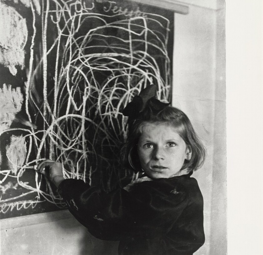 Tereska, a child in a Polish residence for disturbed children, grew up in a concentration camp. She drew a picture of "home" on the blackboard.