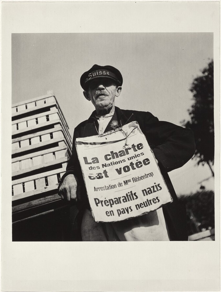 Elderly man with notice, Geneva