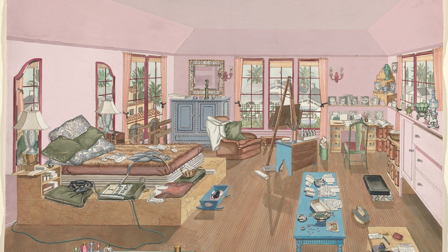 We look slightly down onto a bed on a wide platform, dressers, tables, chairs, and other furniture extending into a deep, pink-walled room in this nearly square watercolor painting. The paint is mostly opaque and flat, and contours and outlines are drawn in graphite. The room has a wood floor and an inset tray ceiling, also pink. Windows with burgundy-red frames and pale pink curtains line the far and side walls. We will start at the bottom of the sheet and move up, which also brings us back in space. A moss-green table set with a tray of colorful perfume bottles, a hairbrush set, dishes, pincushion, and cosmetic powder is closest to us in the lower left corner. A table with pale wood grain extends into the room in the lower right. On it are notes, a black clutch purse, spilled ink under an inkwell, pen, key, coin purse, and perhaps a gray scarf. Continuing along the right wall are a pink dresser holding figurines and knick-knacks, low shelves with thick books, and a desk with a green chair facing away us in the far corner. Black and white portraits are displayed on the desk and on a shelf above it. Back closer to us and farther into the room is a long, blue table with turned legs. It holds boxes and sheets of paper with writing. Beyond it are a blue chest with its unpainted wood back facing us. That chest holds a vase of paint brushes and a tray of bottles. A floor easel stands just beyond it, and an overstuffed and slightly crumpled brown easy chair faces the easel. Along the left wall beyond the green dresser are the bed on the wood platform, which is wide enough to hold an old-fashioned cradle telephone, lamps, books, cushions, and a basket with papers. Pillows, pages with writing, and a furry blanket cover the bed. A pale blue, two-door cabinet is in that far corner with a square mirror hanging above. A blue cradle holding what might be a black sleeping mask is at the foot of the bed; two rectangular boxes, perhaps suitcases, are near the pink dresser to the right; and close to them is a U-shaped appliance, perhaps an old-fashioned foot massager. Views out the windows look onto white-walled houses with gray roofs or peach-colored houses with terracotta tile roofs.