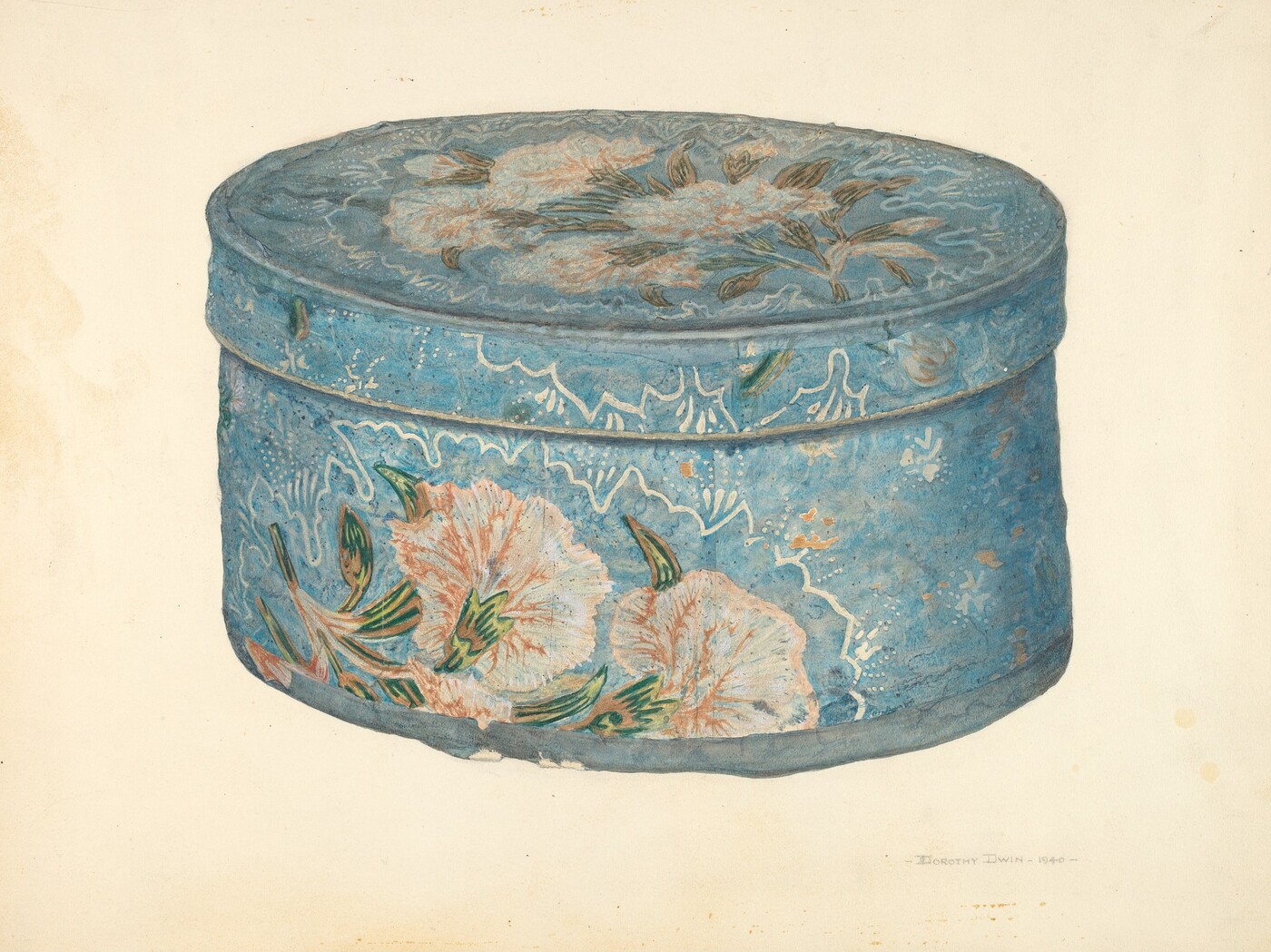 The image shows a large, oval-shaped blue box with floral patterns as the main subject. The color palette includes soft blues, whites, pinks, and greens, which are used in the floral designs that adorn the box. The box is centered in the image, with the oval lid slightly raised, and the floral patterns spread evenly across the surface.