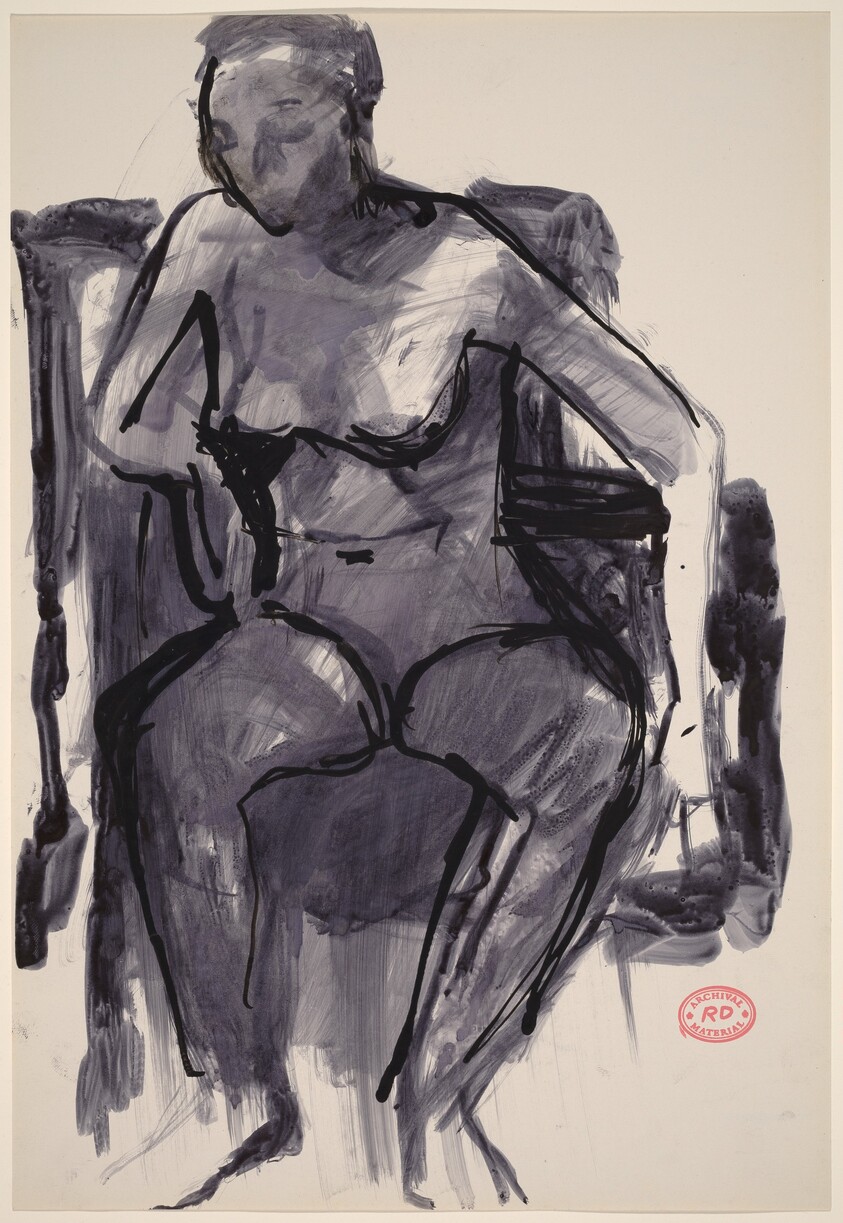 Untitled [female nude seated in armchair]