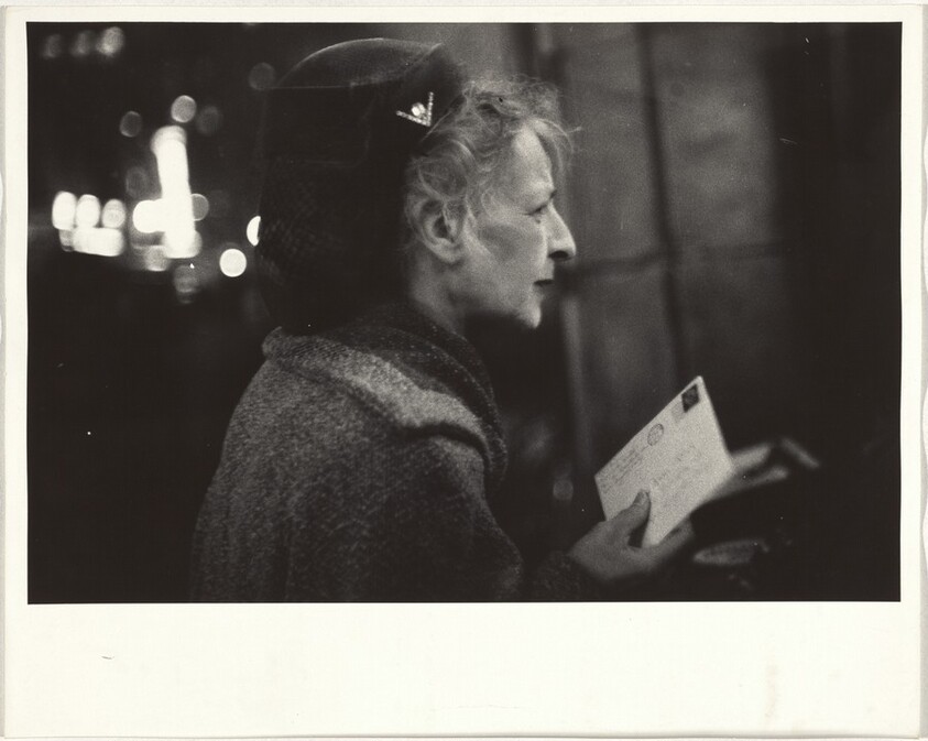 Woman holding letter--Los Angeles