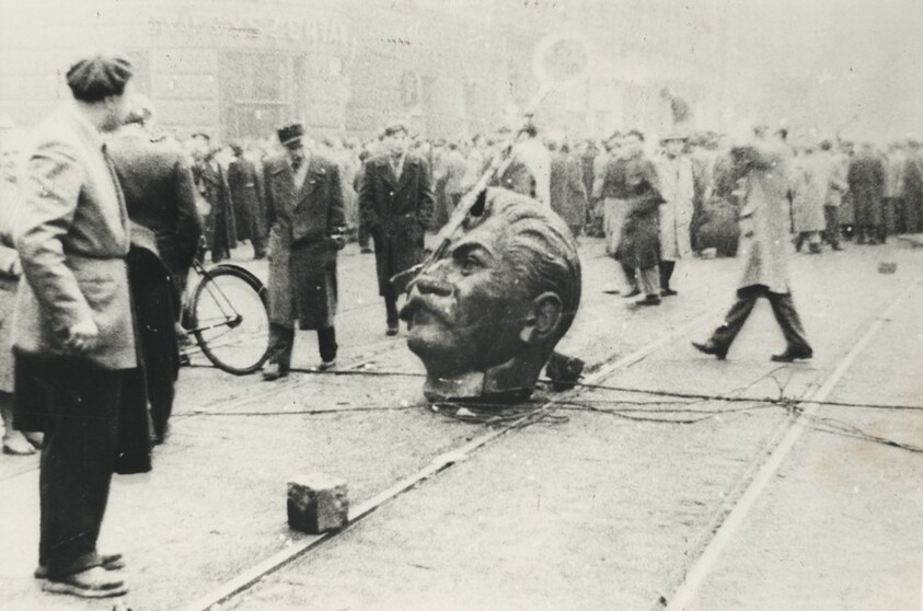 Title from caption on object: “In Budapest, Hungary, a Year Ago, a Statue of the Late Joseph Stalin Was Tumbled to the Street…”