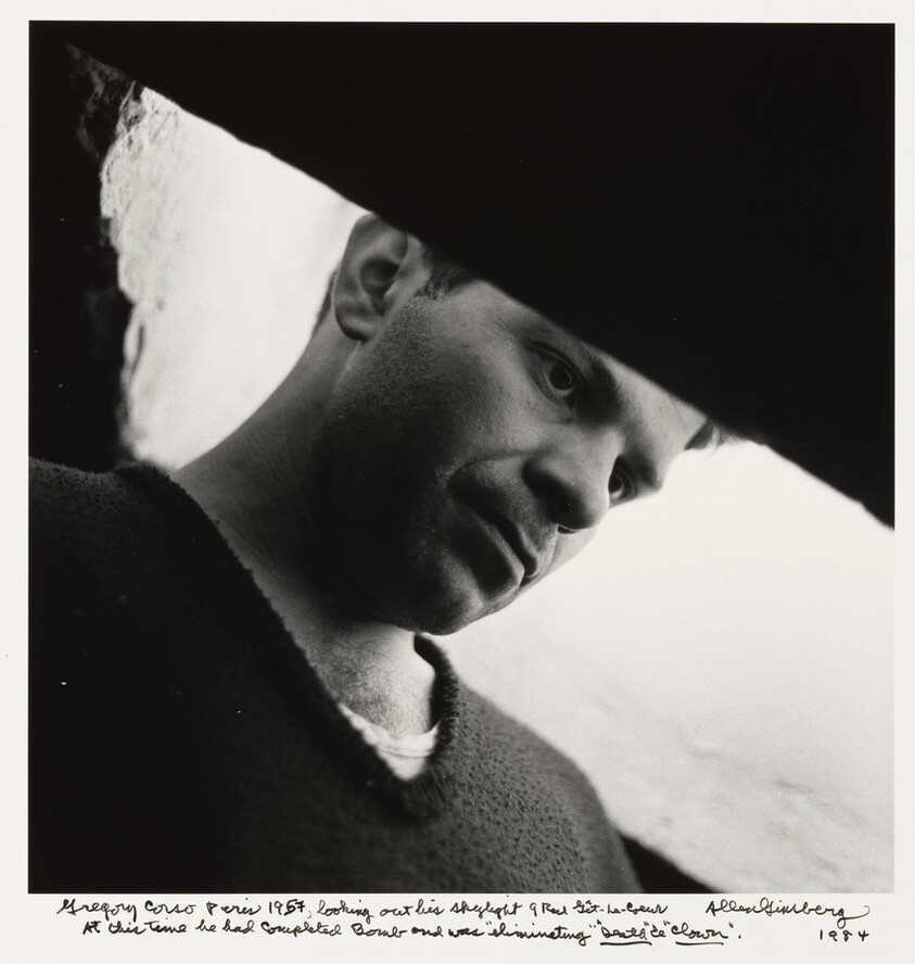 Gregory Corso Paris 1957, looking out his skylight 9 Rue Gît-le-Coeur. At this time he had completed Bomb and was "eliminating ""_Death_" & "_Clown_".