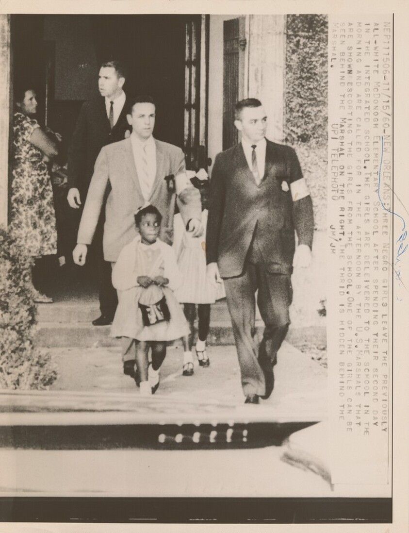 Title from caption on object: “Three Girls Leave the Previously All-White McDonogh Elementary School…”