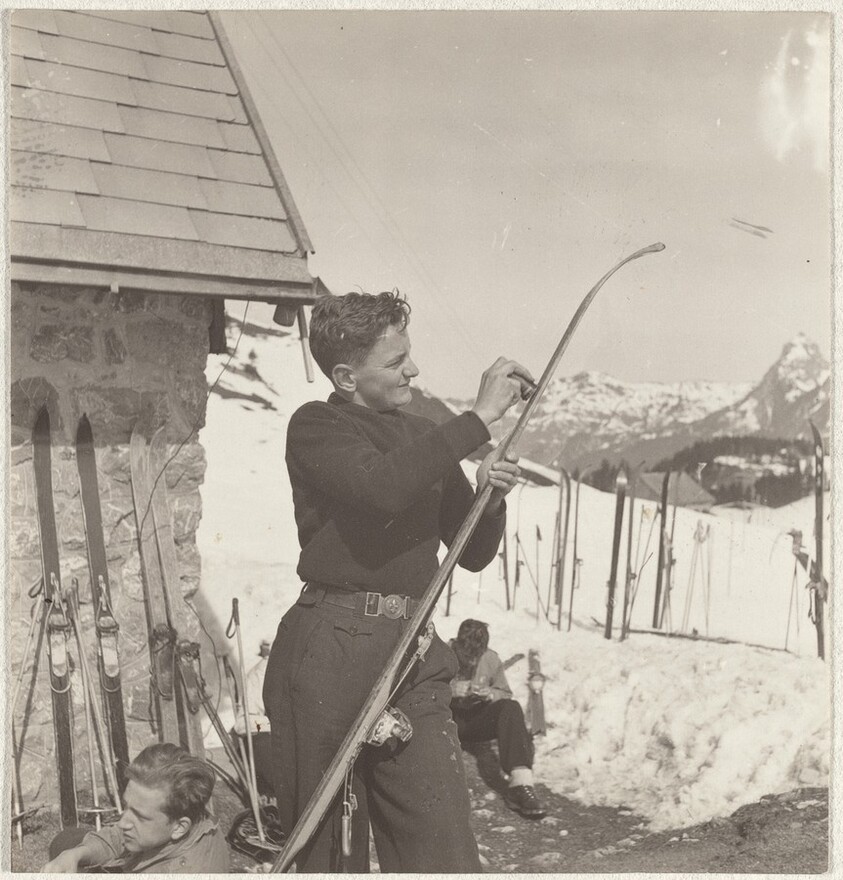 Boy waxing ski--Sports