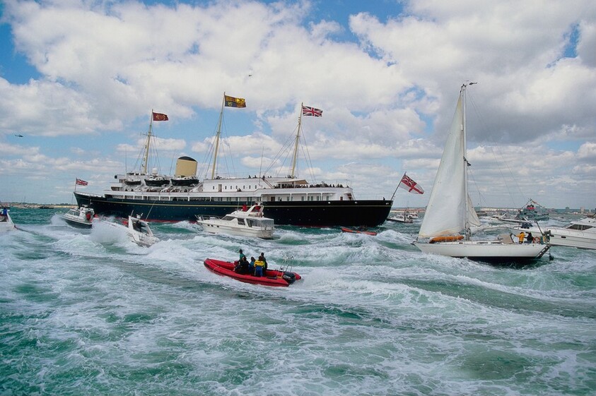 Her Majesty’s Royal Yacht Britannia with Queen Elizabeth II, President William J. Clinton, and Various Other Leaders of the Allied Powers of WWII on Board as They Leave Portsmouth, England, for Normandy, France, to Commemorate the 50th Anniversary of D-Day