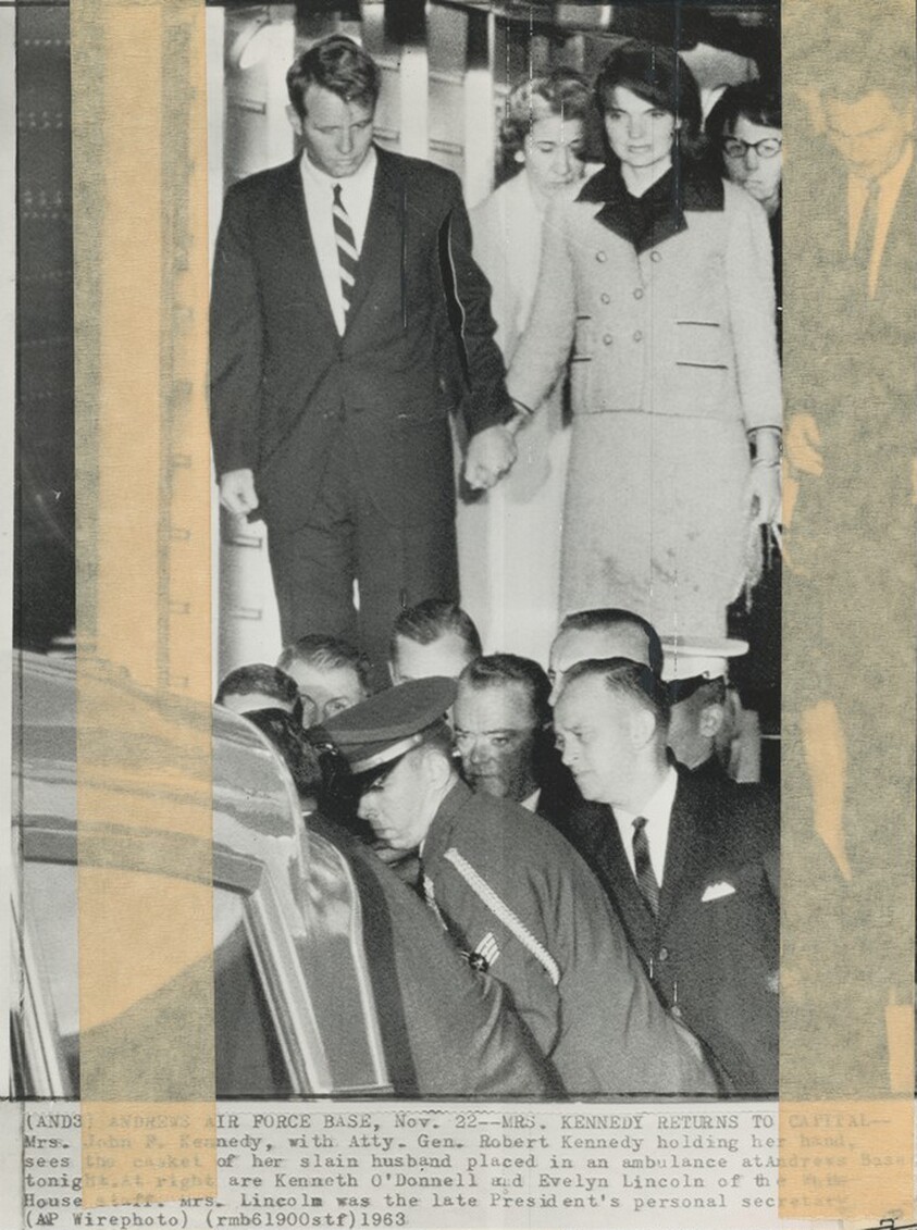 Title from caption on object: “Mrs. Kennedy Returns to Capital”